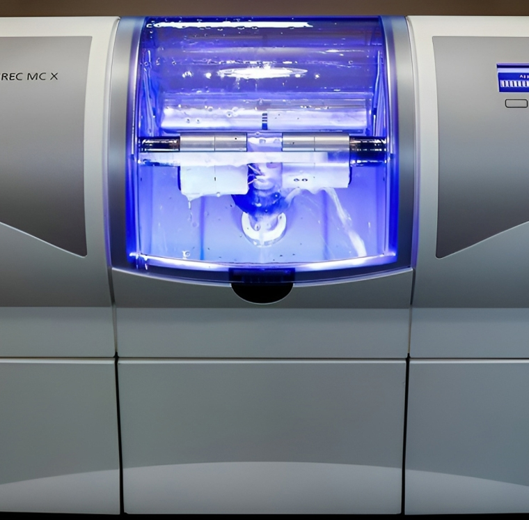 Dental laboratory analyzer with illuminated blue chamber, scientific diagnostic equipment.